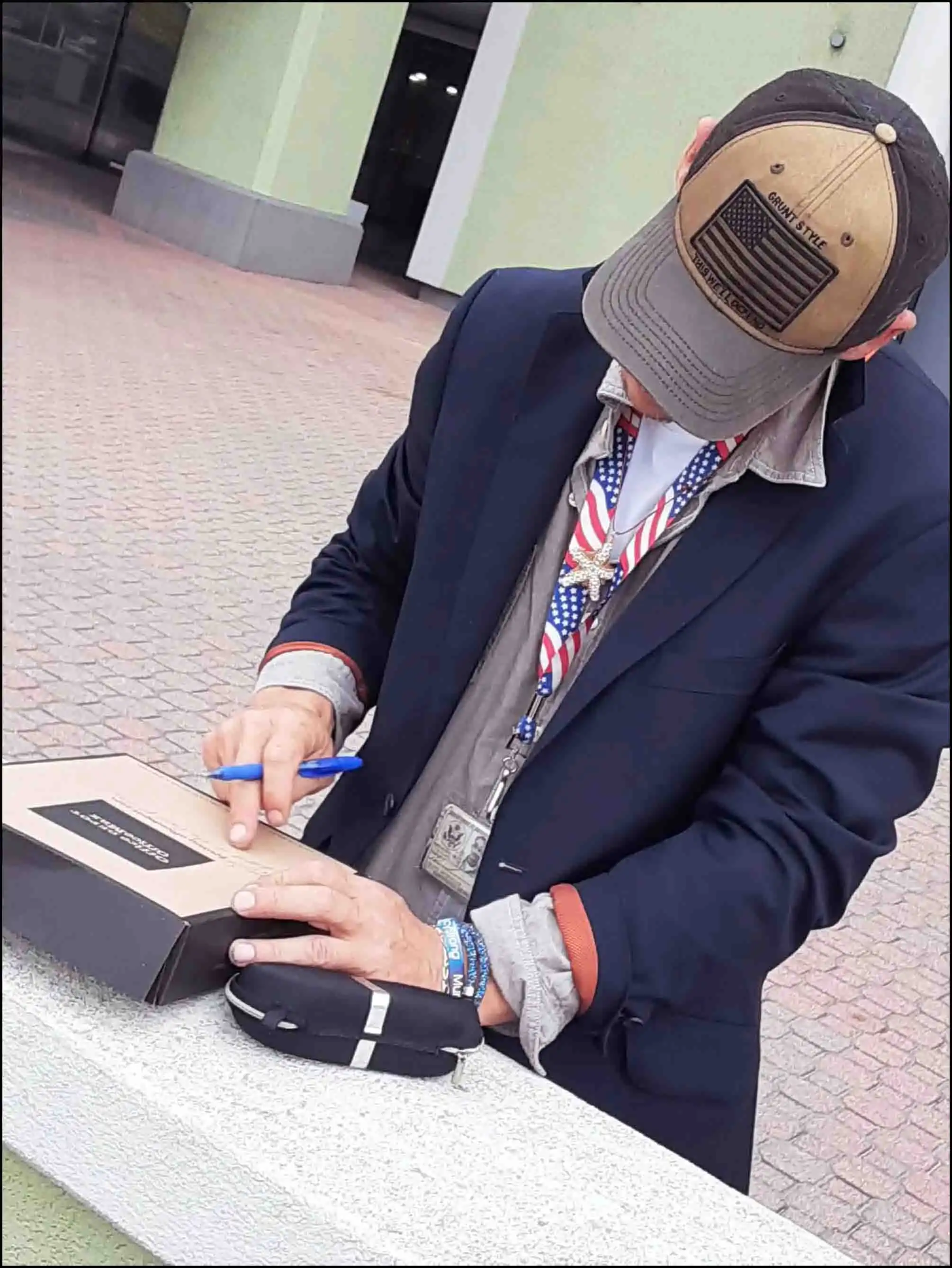 Book Author & Veteran David Haave signing his first copy of the Butterflies and Friendships book for the kids in Port Arthur, Texas, USA... -- David Haave